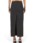 Lost Labels black maxi skirt with back vent and cutout waist detail worn by a model from the back view