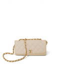 Lost Labels Chanel quilted beige caviar leather shoulder bag with gold chain strap and iconic CC turn-lock closure.