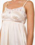 Lost Labels Christian Dior cream silk mid-length dress featuring delicate white lace trim on the bodice