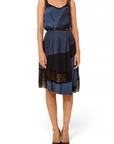Lost Labels Nina Ricci silk dress in blue and black with sheer paneling and fluid drape, worn by a model.