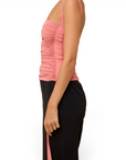 Lost Labels Plein Sud pink ruched body-conscious top worn by a model in a side profile view