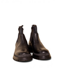 Lost Labels Prada black leather Chelsea boots with a chunky lug sole and elastic side panels.
