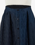 Lost Labels Vetements reversible skirt in navy and black with an all-over logo print and button-down front