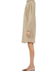 Lost Labels beige Bottega Veneta long sleeve button down shirt dress with architectural waist seaming, side view