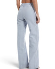 Lost Labels pre-owned Bottega Veneta blue viscose and cotton blend trousers worn by a model, back view