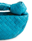 Lost Labels Bottega Veneta Mini Jodie handbag in vibrant turquoise lambskin leather with signature Intrecciato weave.