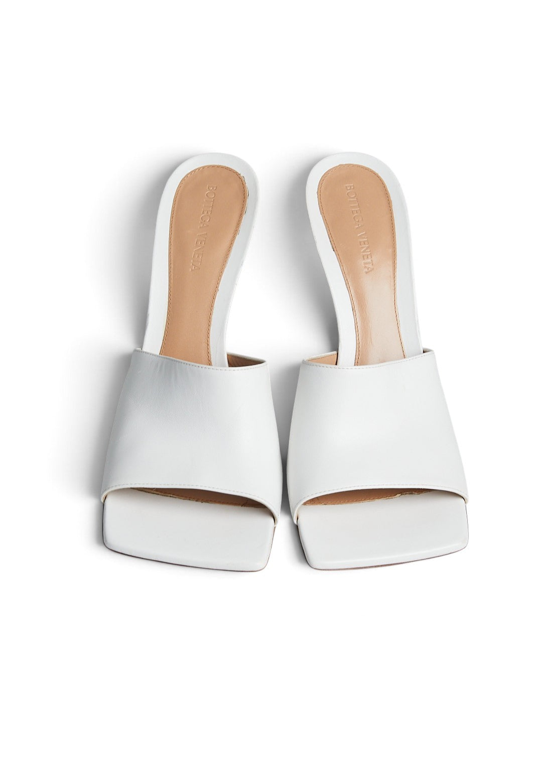 Lost Labels Bottega Veneta white leather mules with a square-toe silhouette and sculpted stiletto heel.