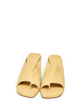 Lost Labels Bottega Veneta pale yellow leather toe-ring mules with a square toe and refined minimalist design.