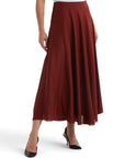 Lost Labels The Row burgundy midi skirt with a fluid A-line silhouette worn by a model with black heels