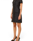 Lost Labels Chanel black linen midi dress with button-down front and cap sleeves worn by a model in black heels.