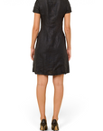 Lost Labels Chanel black linen midi dress with short sleeves, viewed from the back on a model wearing black heels.