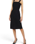 Lost Labels Chanel Boutique black midi wrap dress with a tailored silhouette and thick straps on a model