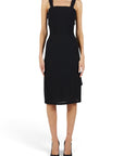 Lost Labels Chanel Boutique black midi wrap dress with a tailored silhouette worn by a model on a white background