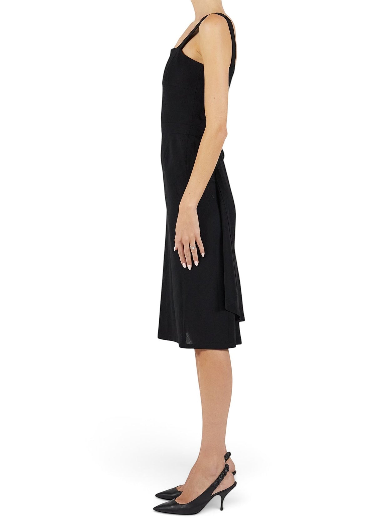 Lost Labels Chanel Boutique black midi wrap dress with a tailored silhouette worn by a model in side profile view