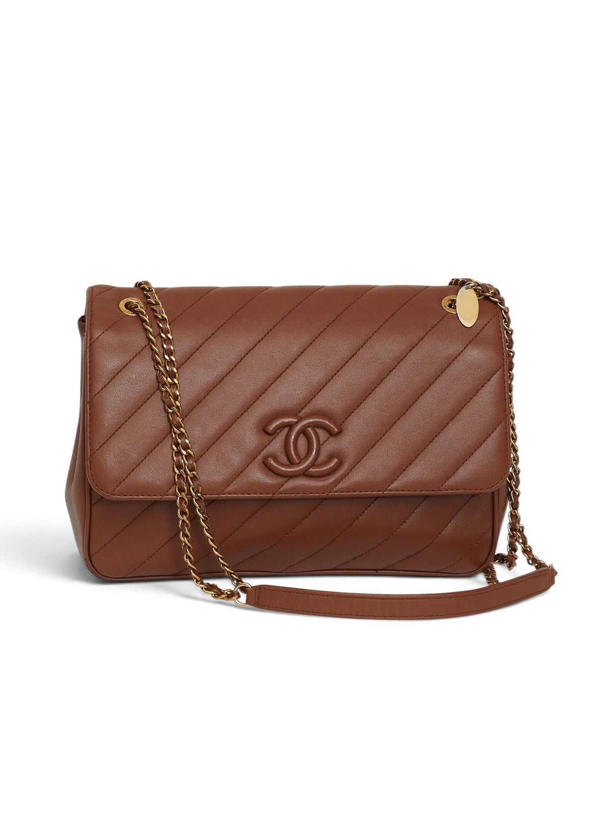 Lost Labels Chanel brown leather flap bag with diagonal quilting, gold chain strap, and signature logo hardware.