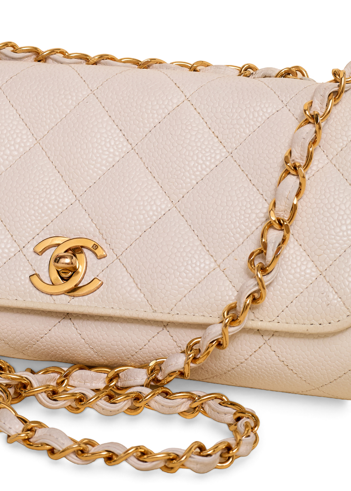 Lost Labels beige quilted leather Chanel bag with gold-tone chain strap and iconic CC turn-lock closure