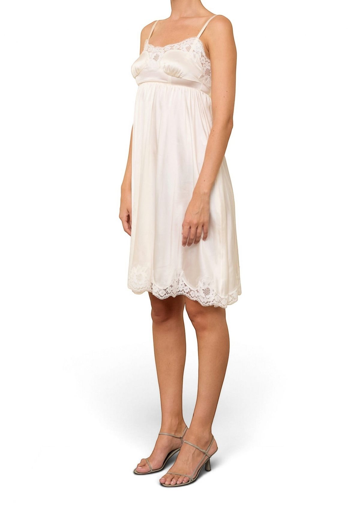 Lost Labels Christian Dior mid-length white silk slip dress with delicate lace trim worn by a model