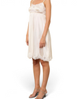 Lost Labels Christian Dior mid-length white silk slip dress with delicate lace trim worn by a model