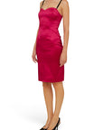 Lost Labels Dolce & Gabbana bright pink bustier midi dress with black straps worn by a model