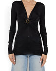 Lost Labels Gucci black long sleeve top featuring a deep V-neck and a gold buckle detail on a model