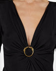 Lost Labels Gucci black long sleeve top featuring a deep V-neck and a decorative gold horsebit buckle detail.