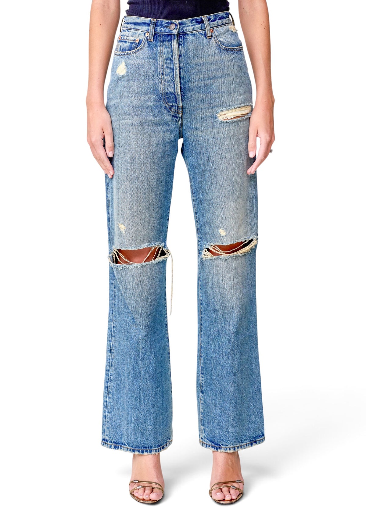 Lost Labels Gucci blue denim jeans featuring a high-waisted fit with distressed knee rips and a straight-leg cut.