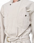 Lost Labels Isabel Marant Etoile beige cotton jumpsuit with a mandarin collar, chest pockets, and a belted waist.