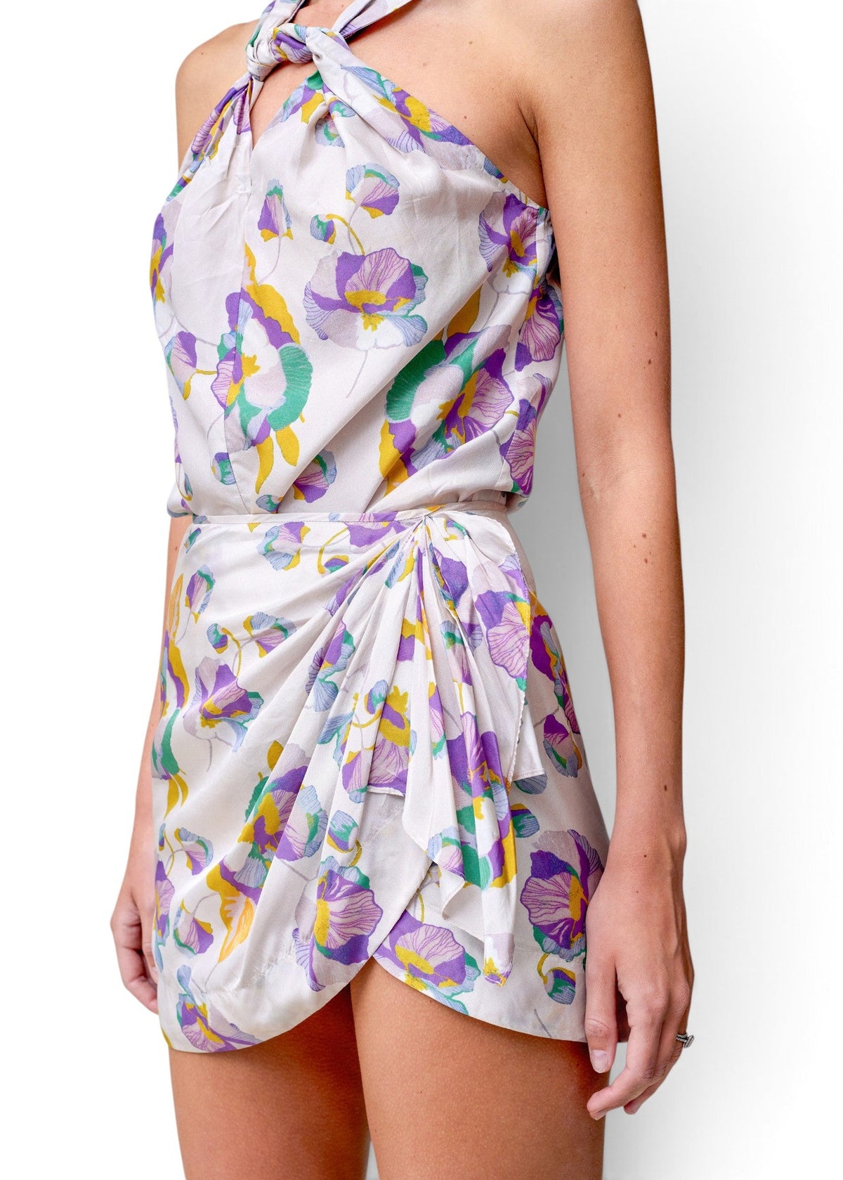 Lost Labels Isabel Marant silk set featuring a floral print halter top and wrap skirt in white, purple, and green.