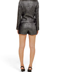 Back view of a Lost Labels Isabel Marant shimmering silver lurex short jumpsuit with structured shoulders