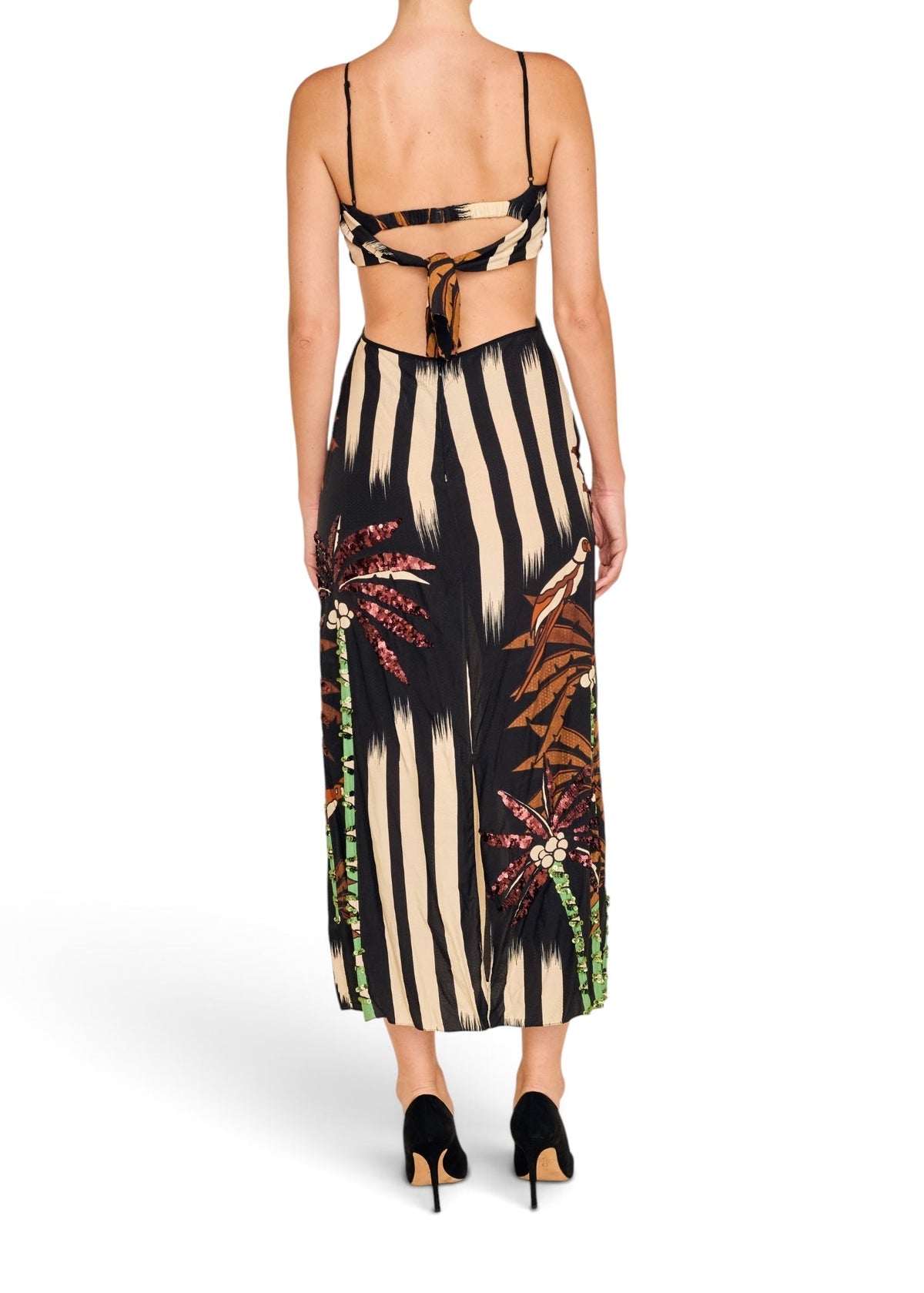 Back view of a Lost Labels Johanna Ortiz midi dress featuring a striped palm tree print, cut-out waist, and sequins.