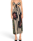 Lost Labels Johanna Ortiz midi dress with black and beige stripes, palm tree motifs, sequins, and cut-out waist detail.