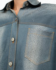 Lost Labels LaQuan Smith blue denim-look leather jacket with silver buttons and a chest pocket