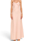 Lost Labels Linni Caro gown in soft blush pink with a sweetheart neckline and spaghetti straps on a model