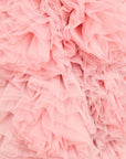 Lost Labels Linni Caro gown featuring layers of soft pink tulle fabric for an elegant, voluminous texture.