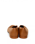 Lost Labels Loro Piana tan leather flats viewed from the back, showcasing refined Italian craftsmanship.