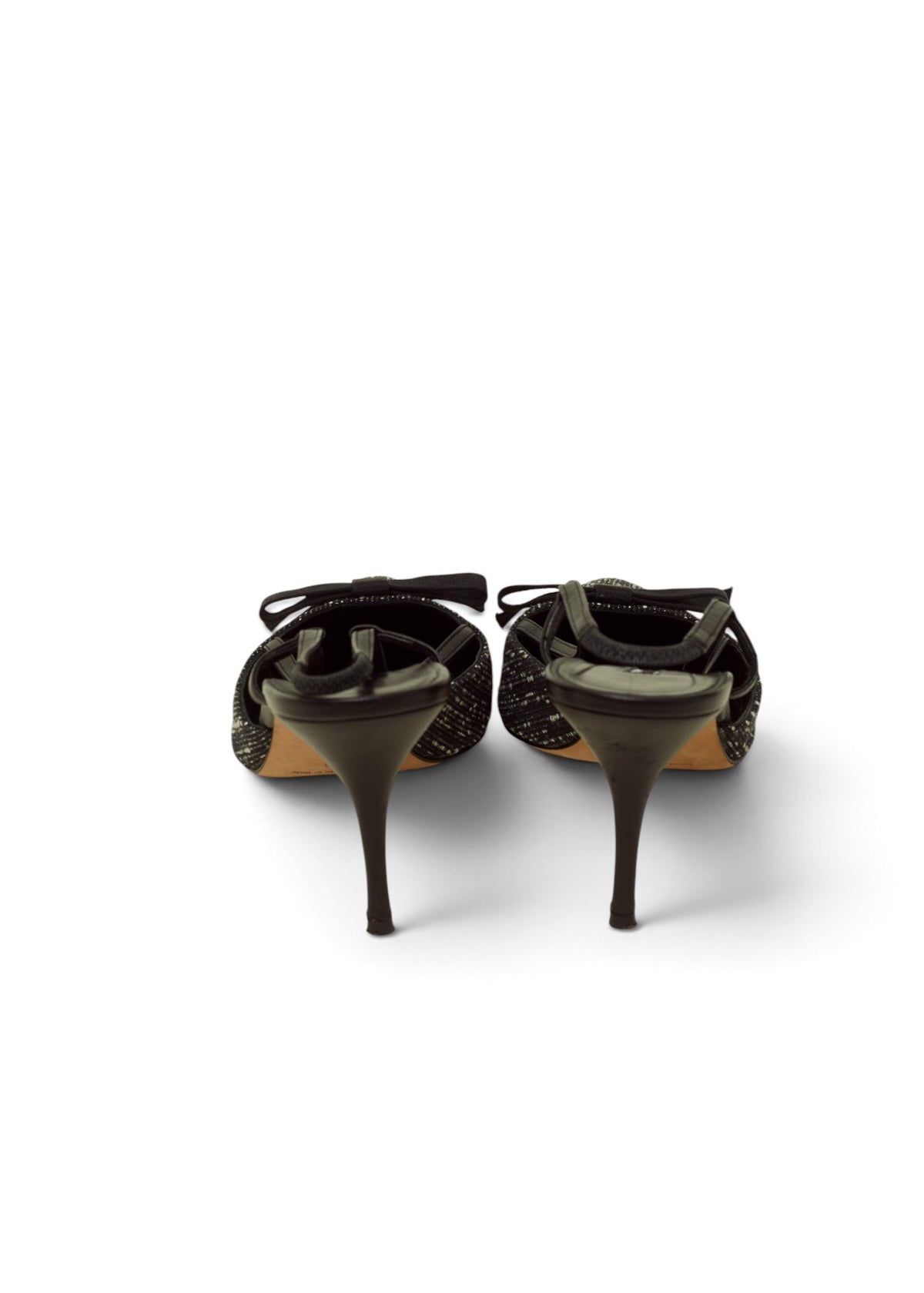 Lost Labels Manolo Blahnik black heels with a delicate bow detail and slim stiletto heel, back view