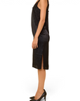 Lost Labels Max Mara black silk slip dress with lace trim and side slit worn by a model in profile view