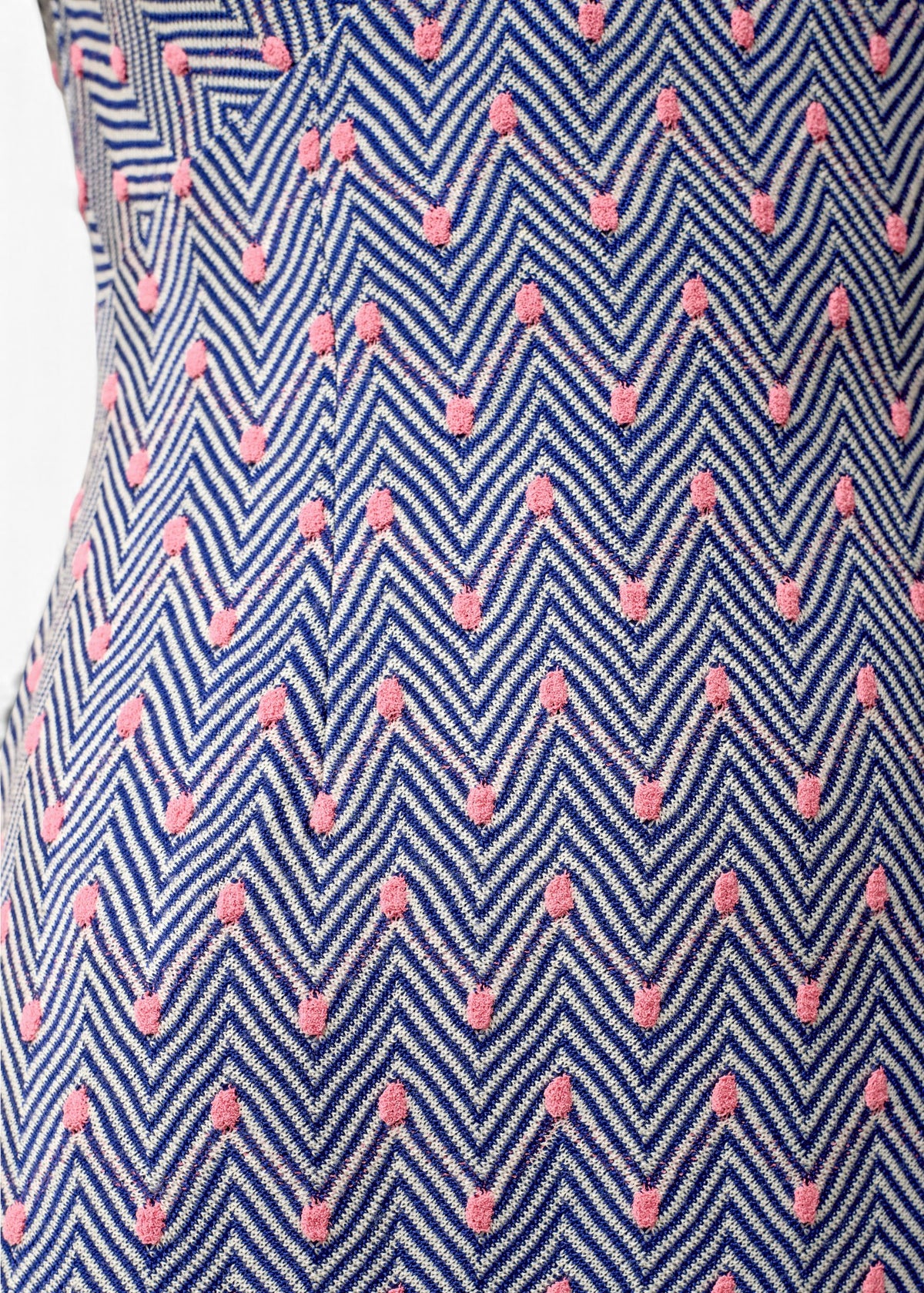 Lost Labels Missoni knit dress featuring a blue and white chevron pattern with textured pink polka dot accents.