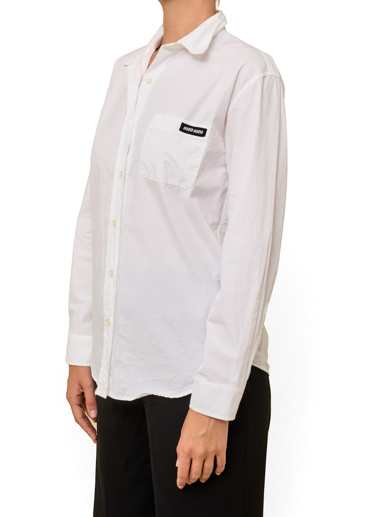 Lost Labels Miu Miu white button-down blouse with a chest pocket and black logo patch worn by a model