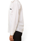 Lost Labels Miu Miu white cotton button-down blouse with a small black logo patch on the chest pocket