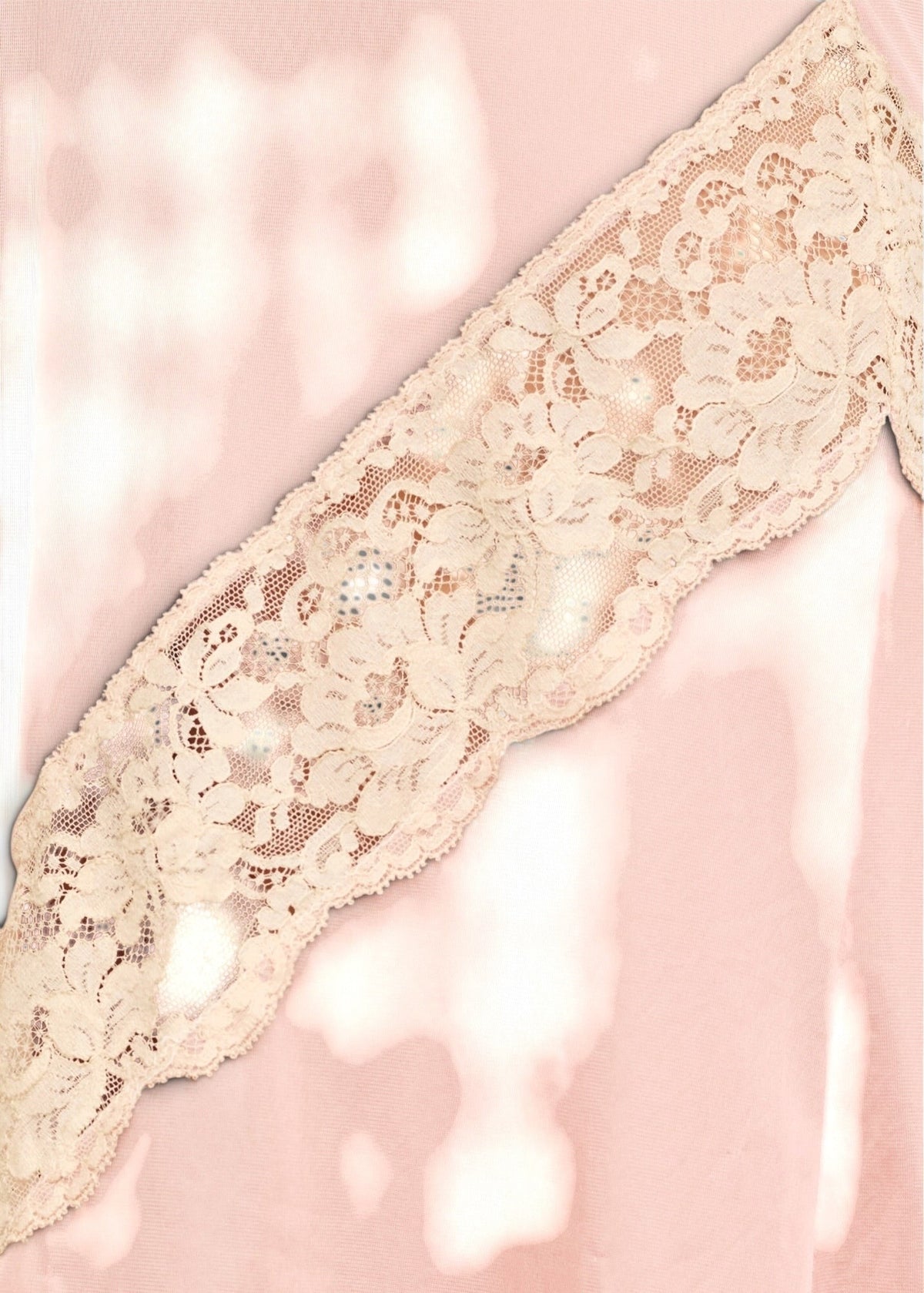 Lost Labels vintage blush pink nylon dress featuring intricate cream lace trim detailing on the bust.