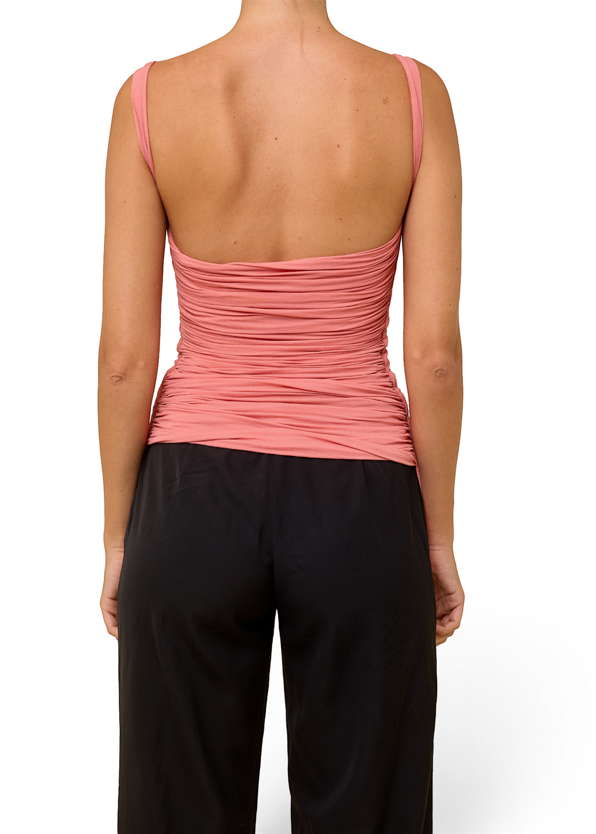 Lost Labels Plein Sud pink sleeveless top with a body-conscious ruched back design worn with black trousers