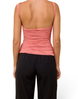 Lost Labels Plein Sud pink sleeveless top with a body-conscious ruched back design worn with black trousers