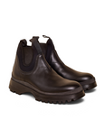 Lost Labels Prada black leather Chelsea boots with elastic side panels and a chunky lug sole for a refined look.