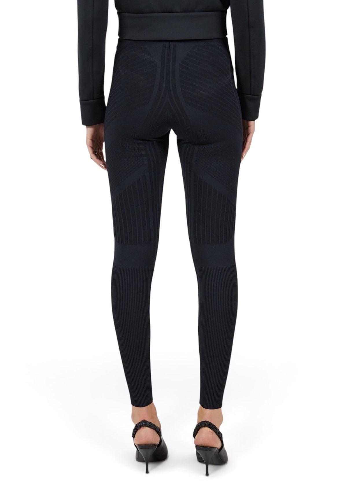 Lost Labels Prada black sheer tights with textured ribbed detailing worn by a model from the back view.