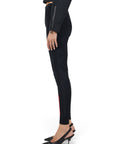 Lost Labels Prada black sheer tights with ribbed texture and red logo detail worn with black heels, side view