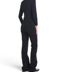 Lost Labels Saint Laurent black wool-blend long-sleeve jumpsuit worn by a model, back view