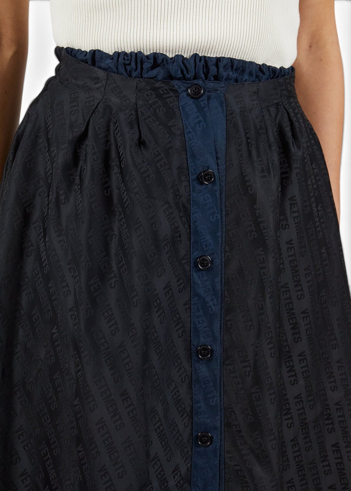Lost Labels Vetements reversible black and navy skirt with all-over logo print and button-down front detail