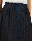 Lost Labels Vetements reversible black and navy skirt with all-over logo print and button-down front detail